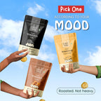 Vayu Farms Roasted Makhana pouches held up against a blue sky with text Pick One According To Your Mood, Roasted, Not heavy