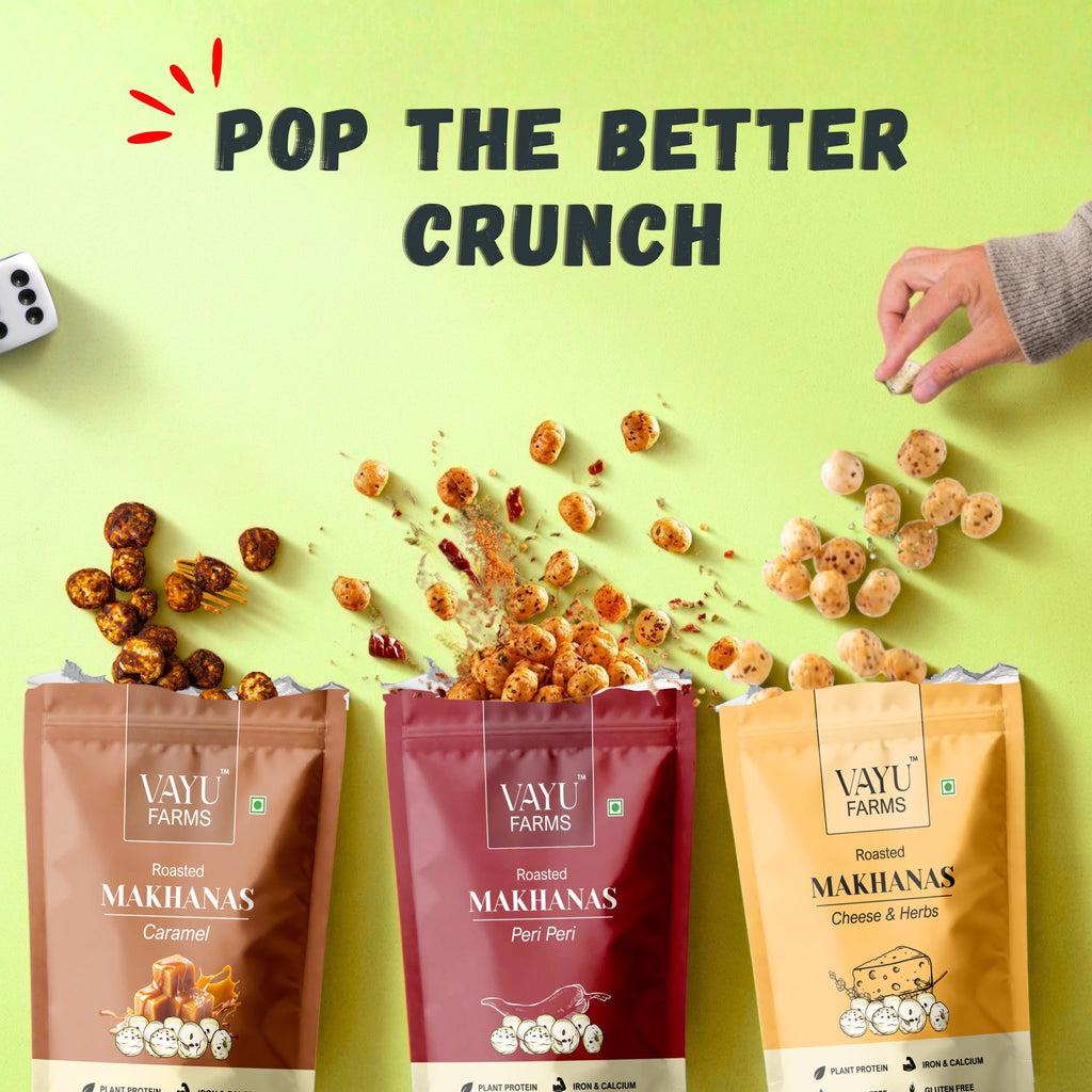 Vayu Farms Roasted Makhana pouches with scattered roasted makhana and text reading Pop the Better Crunch