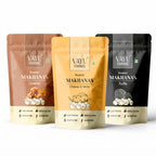 Three stand-up pouches of Vayu Farms Roasted Makhana in Caramel, Cheese & Herbs, and Truffle on a white background