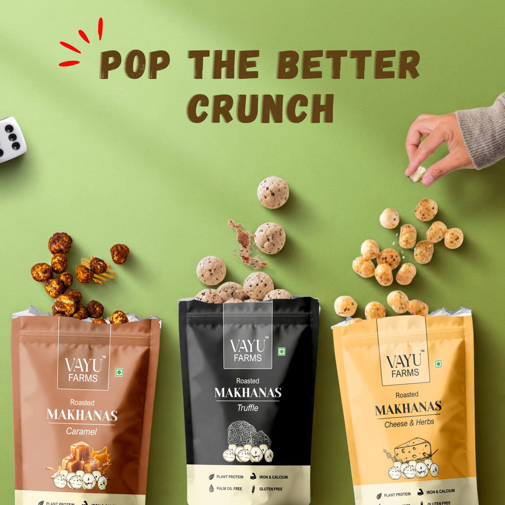 Vayu Farms Roasted Makhana pouches with scattered roasted makhana and text reading Pop the Better Crunch