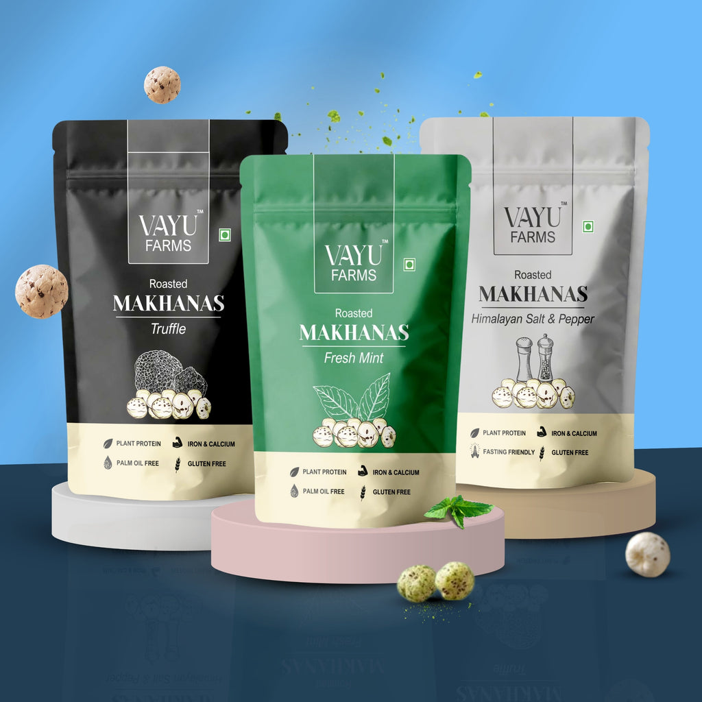 Three stand-up pouches of Vayu Farms Roasted Makhana in Truffle, Fresh Mint, and Himalayan Salt & Pepper flavours